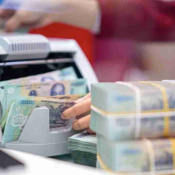 Lãi suất huy động tại nhiều ngân hàng tăng mạnh trong tháng 3, có nơi tiệm cận 9%/năm