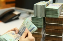 Tăng trưởng tín dụng bị siết chặt, ngân hàng vẫn tự tin lãi cao?