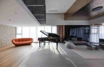 Penthouse đương đại Hà Nội lột xác với những bức tường đá bí ẩn