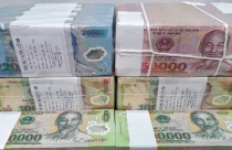 Đổi tiền lẻ, tiền mới “ăn” chênh lệch ngày Tết coi chừng bị phạt