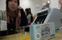 Ngân hàng thư thả hạ lãi suất