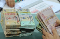 Tiếp tục duy trì lãi suất cơ bản VND ở mức 8%/năm 