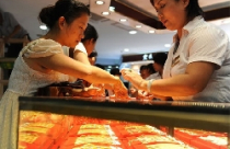 Giá vàng giảm tiếp, USD đứng dưới 21.000 đồng 