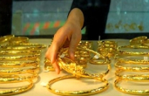 Giá vàng vọt qua ngưỡng 36 triệu, USD mất mốc 21.000 đồng 