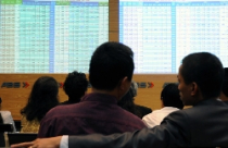 Chứng khoán uể oải trong phiên giao dịch đầu năm 