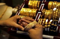 Giá vàng tăng 100.000 đồng/lượng, USD lao dốc 