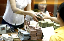 NHNN yêu cầu giảm tốc độ cho vay bất động sản, chứng khoán