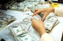 Đại lý thu đổi ngoại tệ: Tay dài đến đâu? 