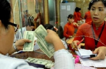 Đi nước ngoài được mua tối thiểu 100 USD mỗi ngày 