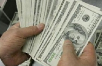 Giảm 5 đồng, tỷ giá liên ngân hàng còn 20.703 đồng/USD 