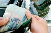 Xoay xở với dư nợ tín dụng phi sản xuất 