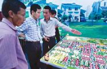 Thiếu tiền, doanh nghiệp địa ốc thanh toán bằng sản phẩm 