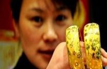 Vàng và USD tự do cùng giảm mạnh 