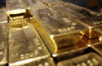 Nhu cầu giữ tiền mặt khiến vàng xuống dưới 1.690 USD/ounce 