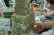 Lãi suất xuống 12%: kẻ mong người lo 