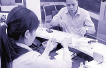 Gỡ bỏ hay tiếp tục ấn định trần lãi suất huy động? 