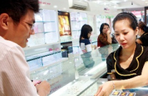 Giá vàng không thể tăng mạnh dưới sức ép của USD