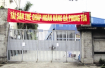 Ồ ạt bán tài sản thế chấp thu nợ