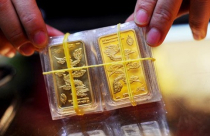 Được khuyên ngừng đấu thầu vàng, Ngân hàng Nhà nước nói gì?