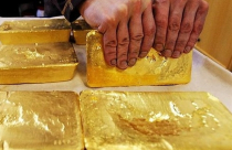 Giá vàng ổn định khi chứng khoán và giá dầu giảm