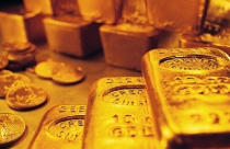 Giá vàng rơi khỏi đỉnh 12 tuần do chốt lời