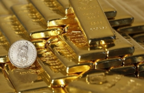 Giá vàng giảm do USD và chứng khoán mạnh lên