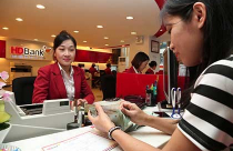 Người vay tiền lo lãi suất tăng