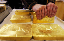 Giá vàng tiến gần đỉnh 13 tháng