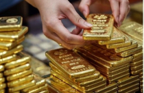 Giá vàng lên cao nhất 2 tuần khi USD suy yếu