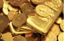 Giá vàng rơi khỏi đỉnh 5 tuần khi USD hồi phục