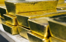 Giá vàng tiếp tục tăng bất chấp USD mạnh lên