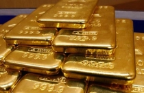 Giá vàng lập đỉnh 2 năm do đồn đoán Fed giảm lộ trình nâng lãi suất