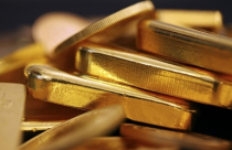 Giá vàng bắt đáy 2 tuần do triển vọng Fed nâng lãi suất