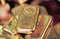 Giá vàng giảm khi USD và chứng khoán mạnh lên