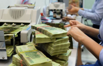 Bộ Tài Chính: Nợ công năm 2018 xuống dưới 61% GDP, vốn giải ngân xây dựng cơ bản chậm chuyển biến