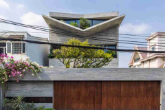 Nhà phố TP.HCM: Hệ mái V độc bản và trục xương sống vườn đôi xuyên suốt