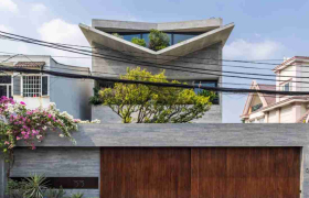 Nhà phố TP.HCM: Hệ mái V độc bản và trục xương sống vườn đôi xuyên suốt